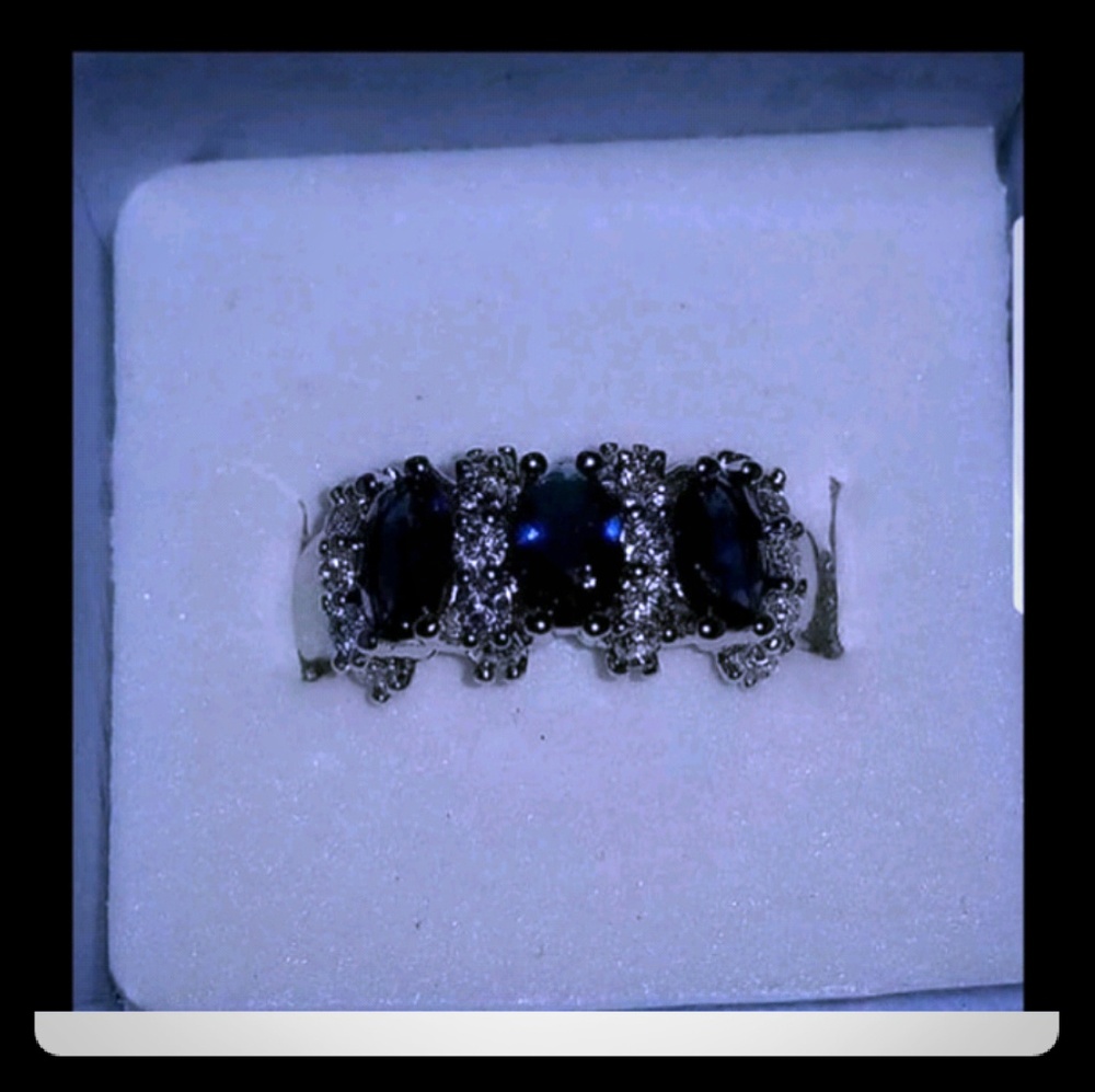 Silver and lab created blue and white Sapphires